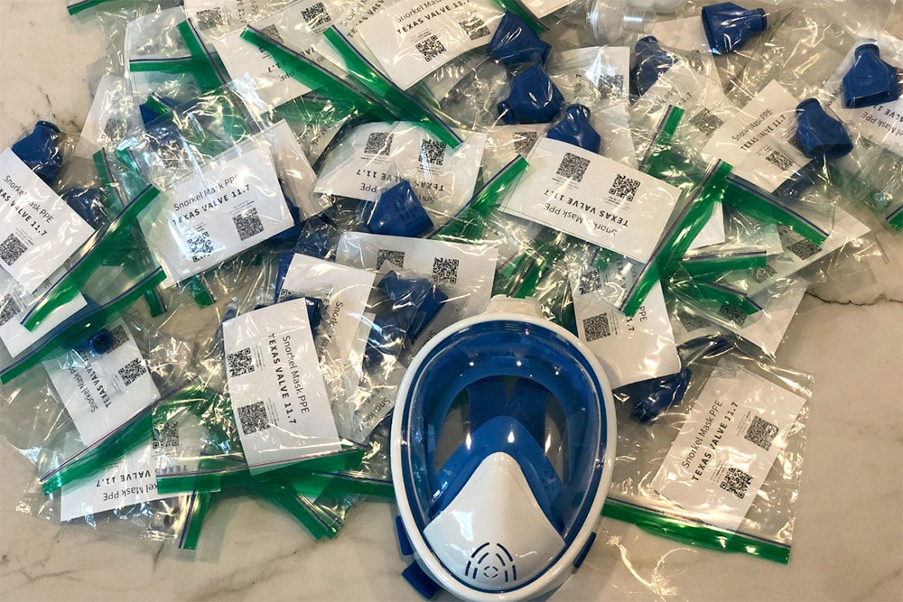 3D-printed adapters that can convert a snorkel mask into protective gear for health care workers are packaged and ready for distribution.